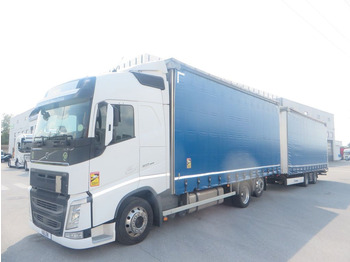 Curtainsider truck Volvo FH460 6x2 tandem jumbo 7.3+8.2m: picture 1