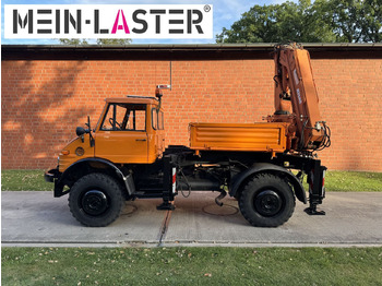 Crane truck, Dropside/ Flatbed truck Unimog U 1100 Atlas AK 3006 nur 14.215 km-1. Hand: picture 4 Crane truck, Dropside/ Flatbed truck Unimog U 1100 Atlas AK 3006 nur 14.215 km-1. Hand: picture 4