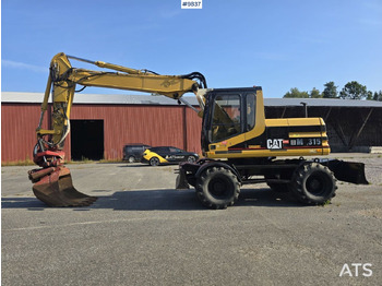 Wheel excavator CATERPILLAR M315