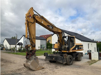 Wheel excavator CAT M320: picture 2