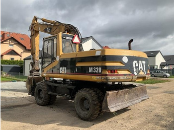 Wheel excavator CAT M320: picture 3