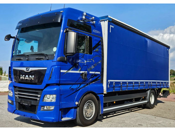 Curtainsider truck MAN TGX