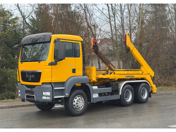 Skip loader truck MAN TGS