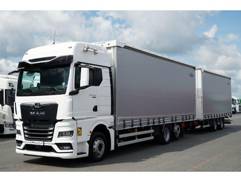 Curtainsider truck MAN TGX