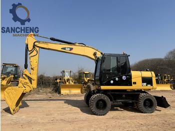 Wheel excavator CATERPILLAR M320