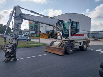Wheel excavator CATERPILLAR M313D