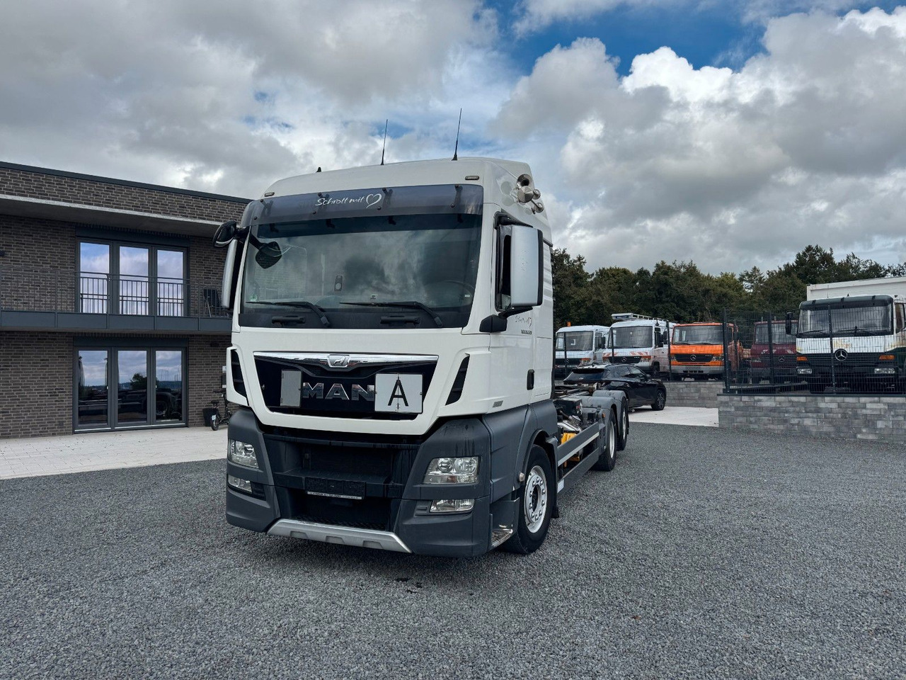 MAN TGX 26.520 D38 Abrollkipper Multilift - Hook lift truck: picture 3 MAN TGX 26.520 D38 Abrollkipper Multilift - Hook lift truck: picture 3