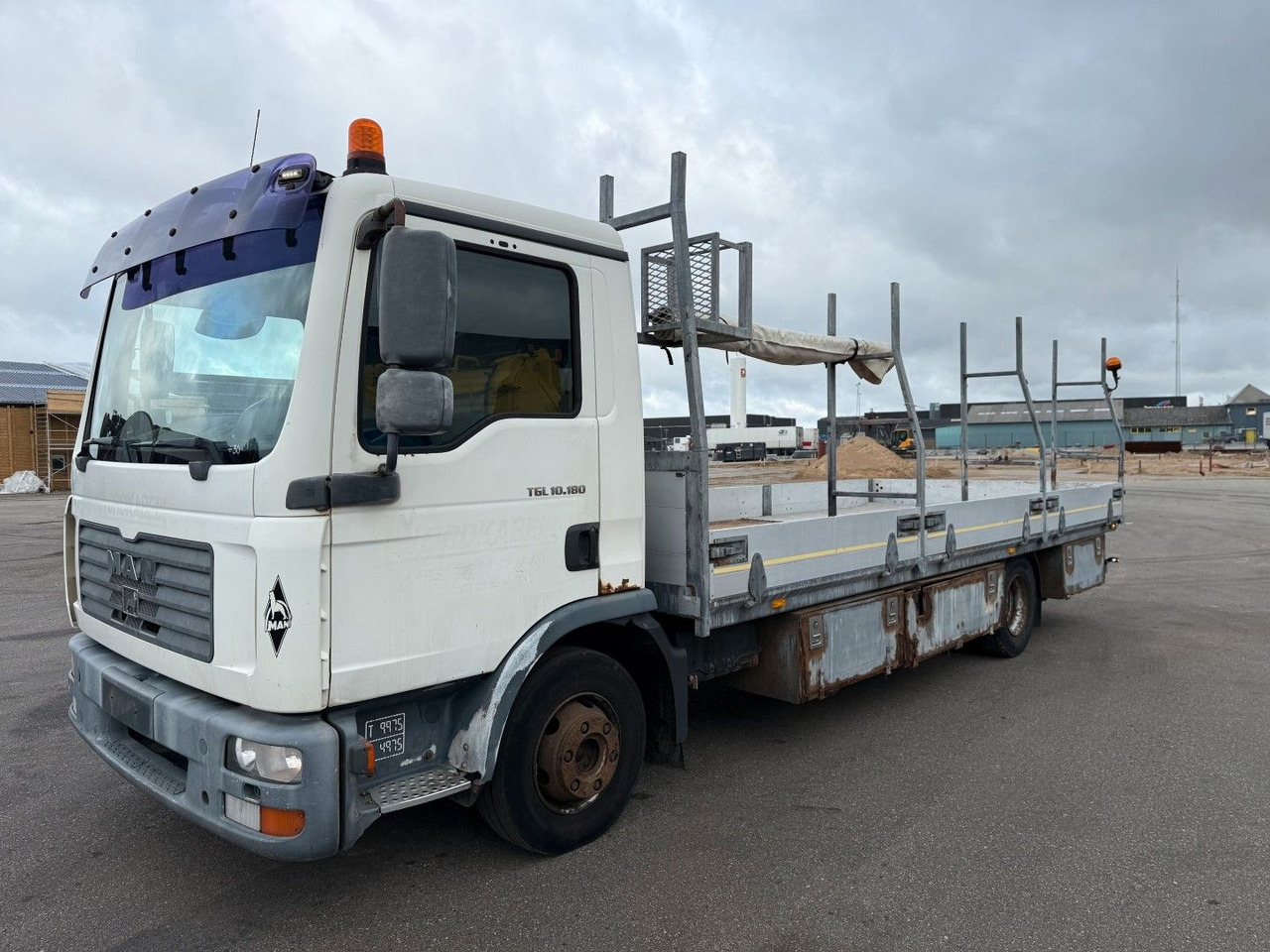 MAN TGL 10.180 4x2 Flatbed 6,80 m. Euro 3 - Dropside/ Flatbed truck: picture 1 MAN TGL 10.180 4x2 Flatbed 6,80 m. Euro 3 - Dropside/ Flatbed truck: picture 1