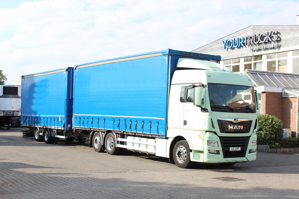 MAN TGX 26.460 Retarder Plane-Zug 120M3 Durchlade - Curtainsider truck: picture 1 MAN TGX 26.460 Retarder Plane-Zug 120M3 Durchlade - Curtainsider truck: picture 1