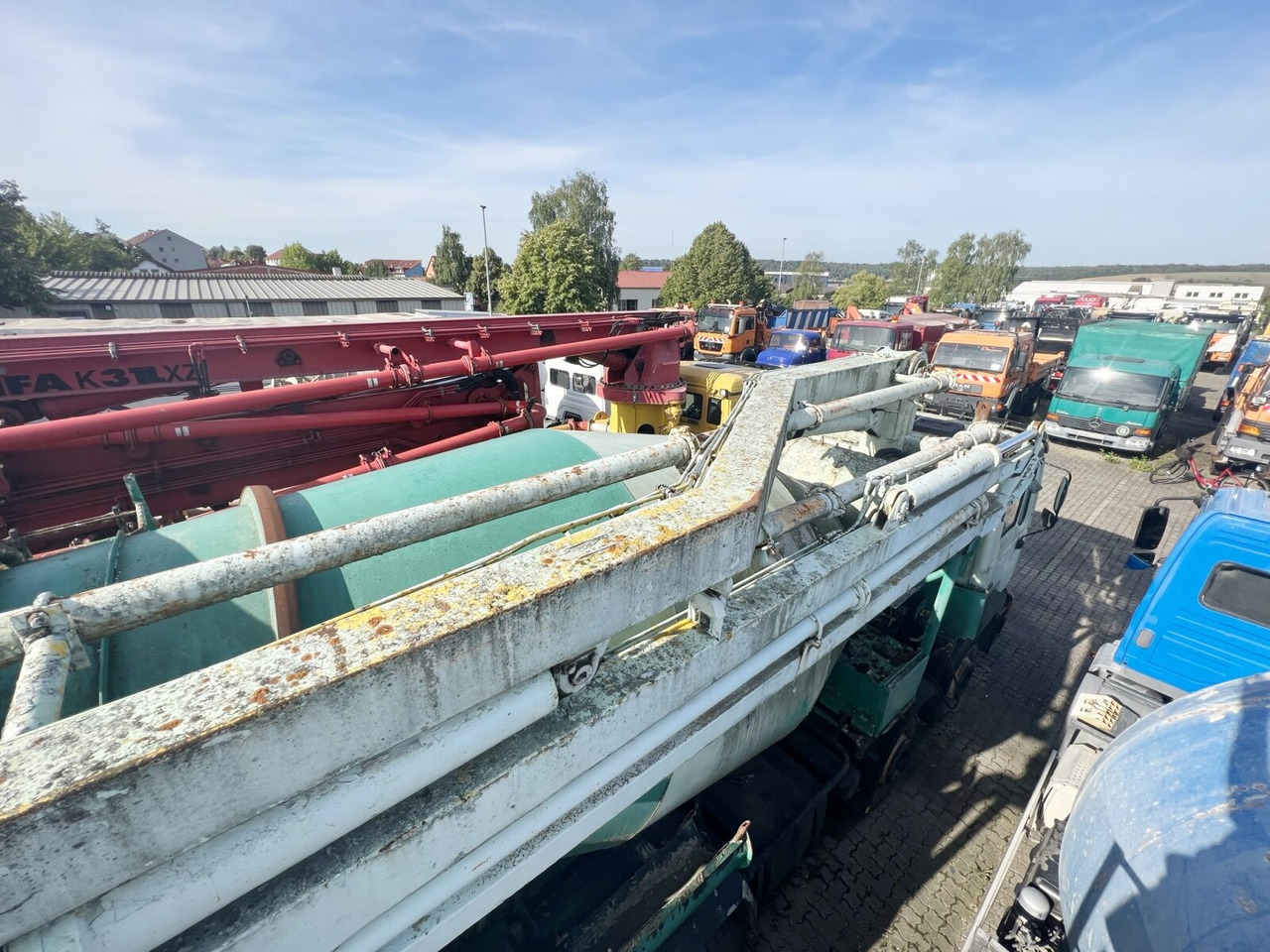 MAN 33.292 8x4 33.292 8x4 Mischer Stetter 7m³ mit Pumpe Schwing 21m, 6-Zylinder - Concrete mixer truck: picture 4 MAN 33.292 8x4 33.292 8x4 Mischer Stetter 7m³ mit Pumpe Schwing 21m, 6-Zylinder - Concrete mixer truck: picture 4