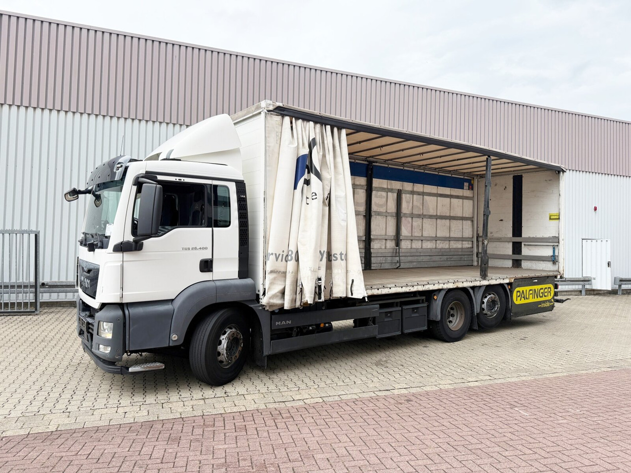 MAN TGS 26.400 6x2-4 LL TGS 26.400 6x2-4 LL, Lenk-/Liftachse - Dropside/ Flatbed truck, Crane truck: picture 1 MAN TGS 26.400 6x2-4 LL TGS 26.400 6x2-4 LL, Lenk-/Liftachse - Dropside/ Flatbed truck, Crane truck: picture 1