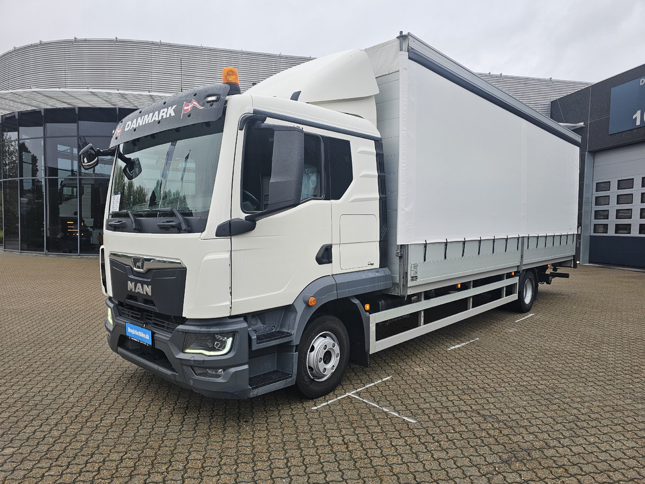 MAN TGL 12.250 - Curtainsider truck: picture 1 MAN TGL 12.250 - Curtainsider truck: picture 1