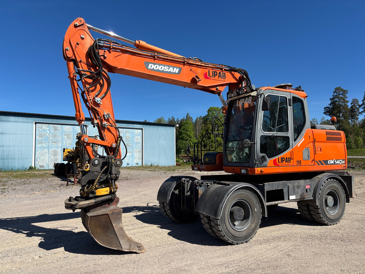 Doosan DX140W - Excavator: picture 1 Doosan DX140W - Excavator: picture 1