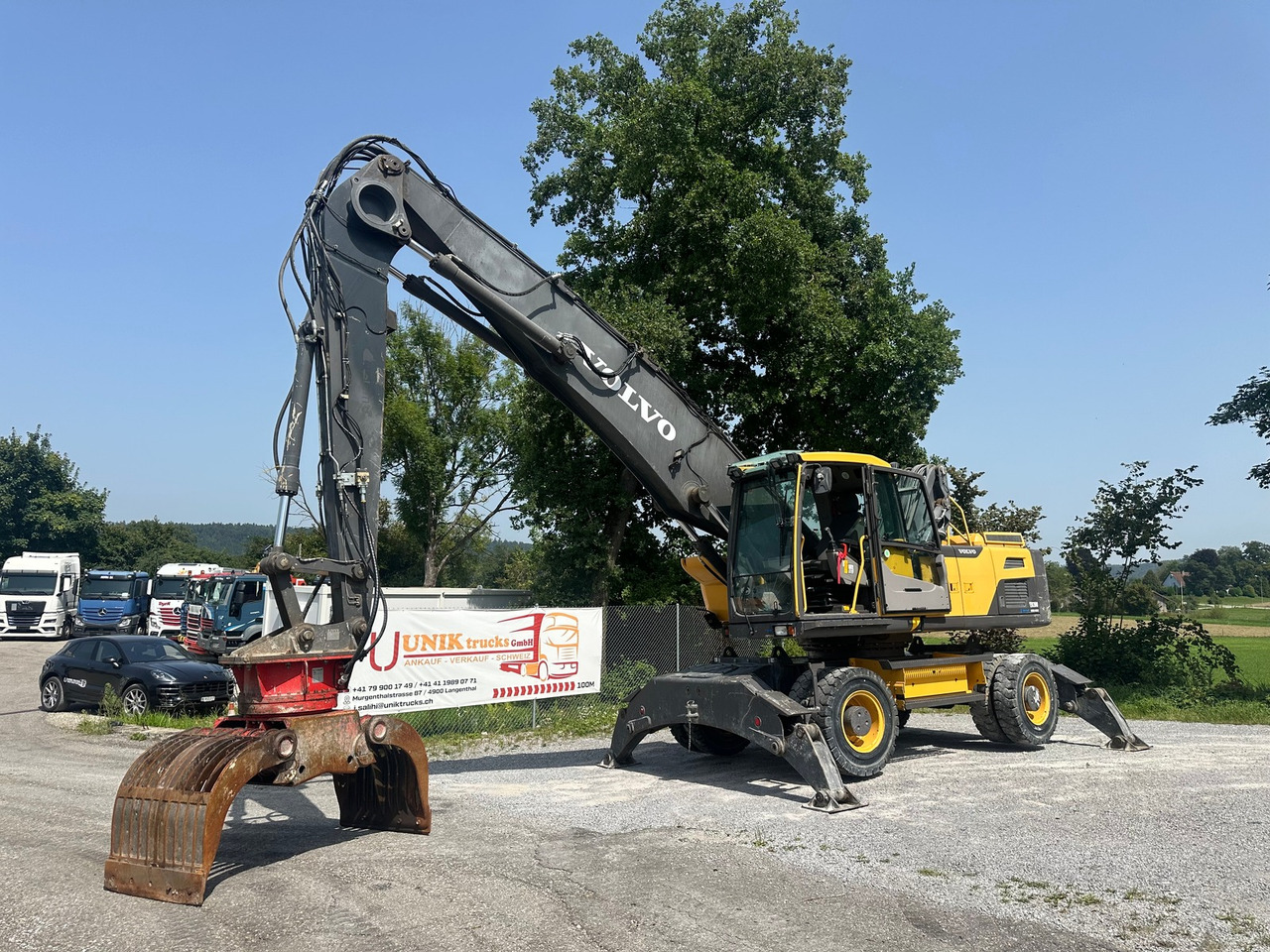 VOLVO EW 210 D 24t Greifer - Excavator: picture 1 VOLVO EW 210 D 24t Greifer - Excavator: picture 1