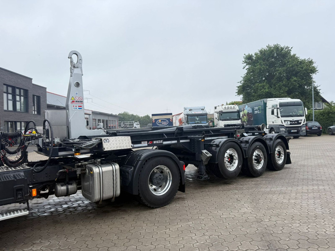 Wiese 3-Achs Abrollkipper Auflieger TRAK Achse - Container transporter/ Swap body semi-trailer: picture 3 Wiese 3-Achs Abrollkipper Auflieger TRAK Achse - Container transporter/ Swap body semi-trailer: picture 3