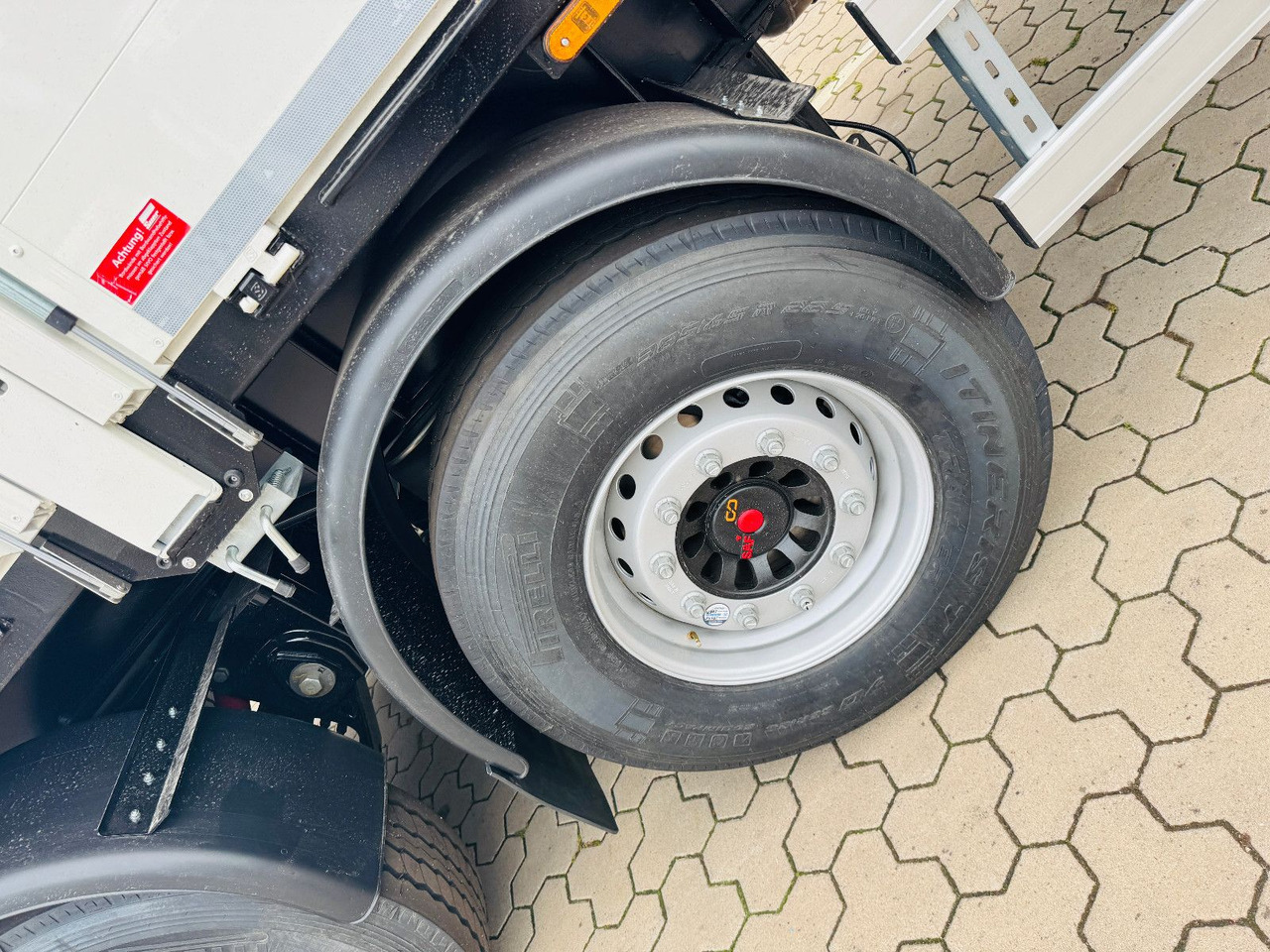 Wiese Baustoffauflieger - Heckkran Kran Fassi - Dropside/ Flatbed semi-trailer: picture 3 Wiese Baustoffauflieger - Heckkran Kran Fassi - Dropside/ Flatbed semi-trailer: picture 3