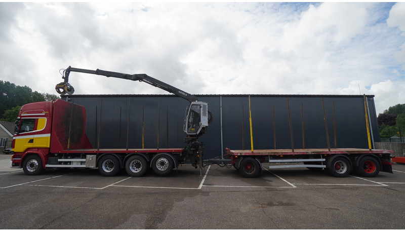 Scania R 580 V8 8X4 LOGTRANSPORT COMBI WITH MTDK YEAR 2012 TRAILER KESLA 46 CRANE - Log truck, Crane truck: picture 1 Scania R 580 V8 8X4 LOGTRANSPORT COMBI WITH MTDK YEAR 2012 TRAILER KESLA 46 CRANE - Log truck, Crane truck: picture 1