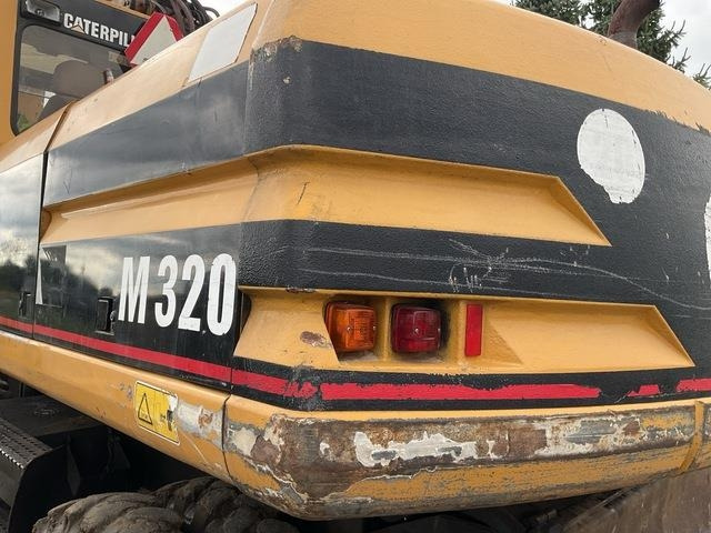 Wheel excavator CAT M320: picture 10
