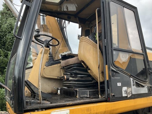 Wheel excavator CAT M320: picture 13