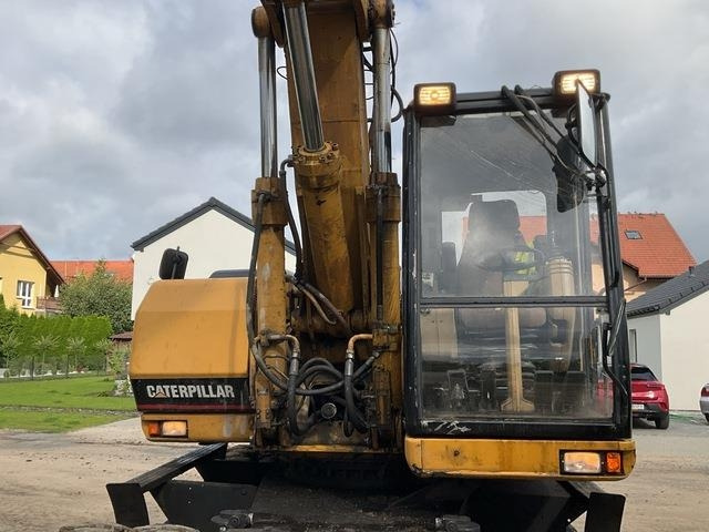 Wheel excavator CAT M320: picture 15