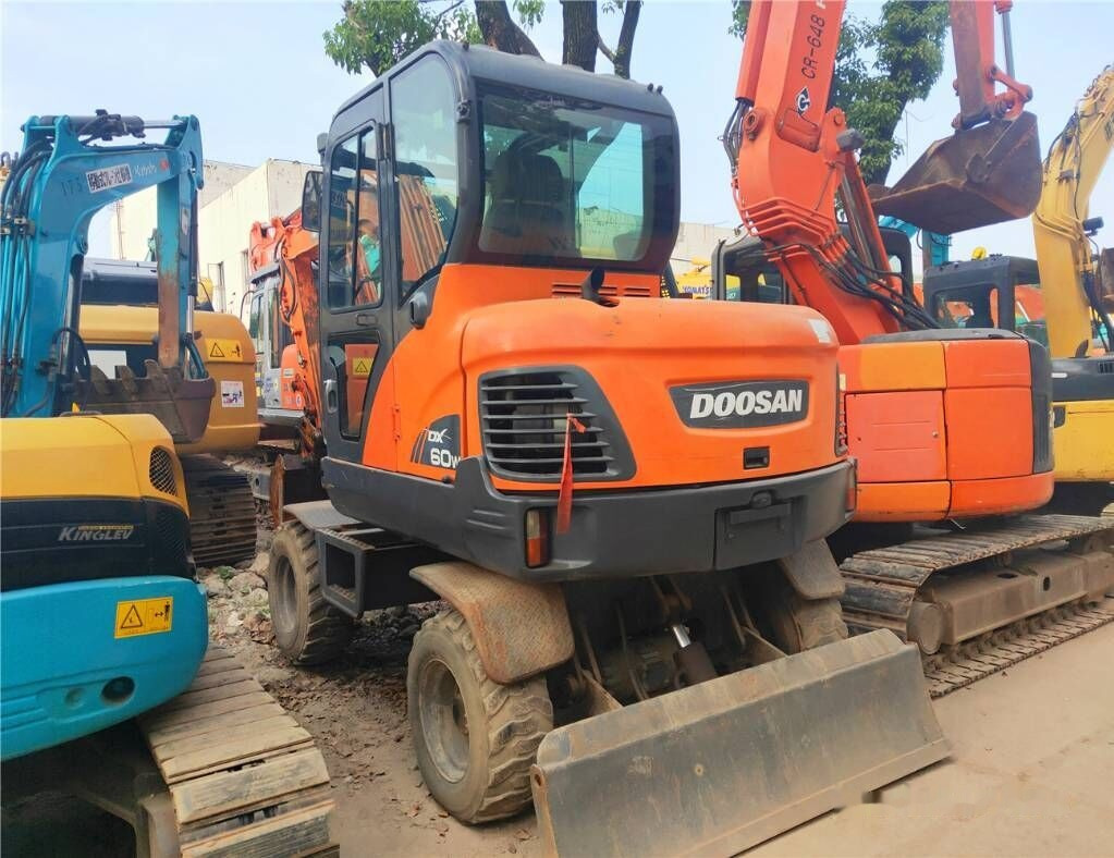 Doosan DX60 W - Wheel excavator: picture 1 Doosan DX60 W - Wheel excavator: picture 1