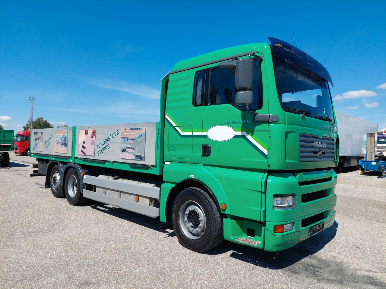 MAN TGA 26.430 LL 6x2-2 - Dropside/ Flatbed truck: picture 2 MAN TGA 26.430 LL 6x2-2 - Dropside/ Flatbed truck: picture 2