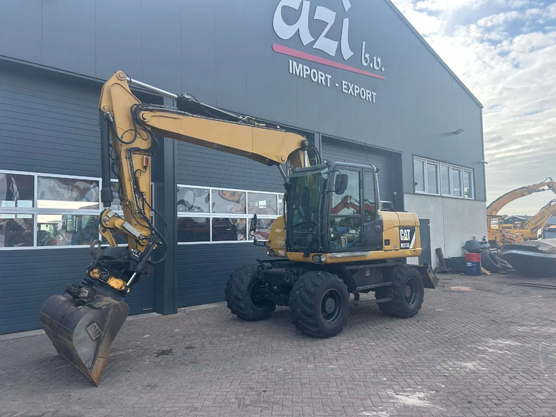 Caterpillar M313D - Wheel excavator: picture 1 Caterpillar M313D - Wheel excavator: picture 1
