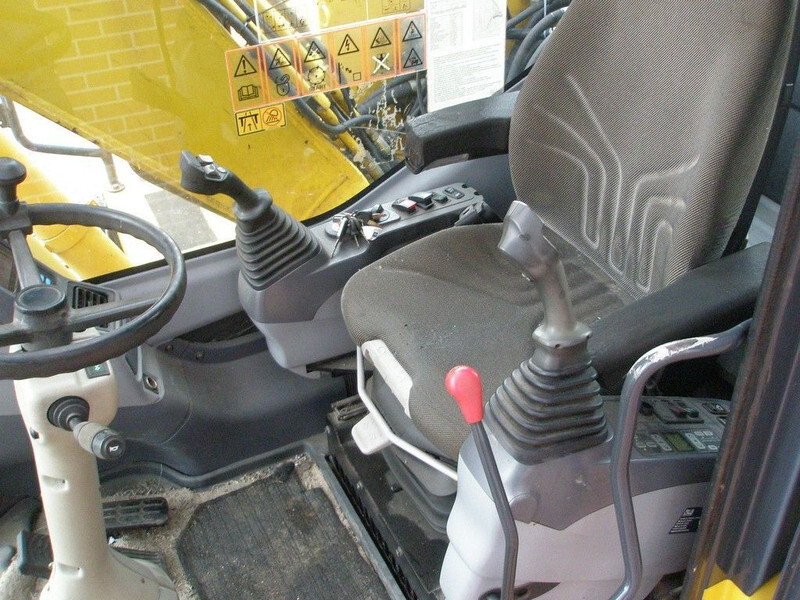 Wheel excavator Komatsu PW140-7: picture 8