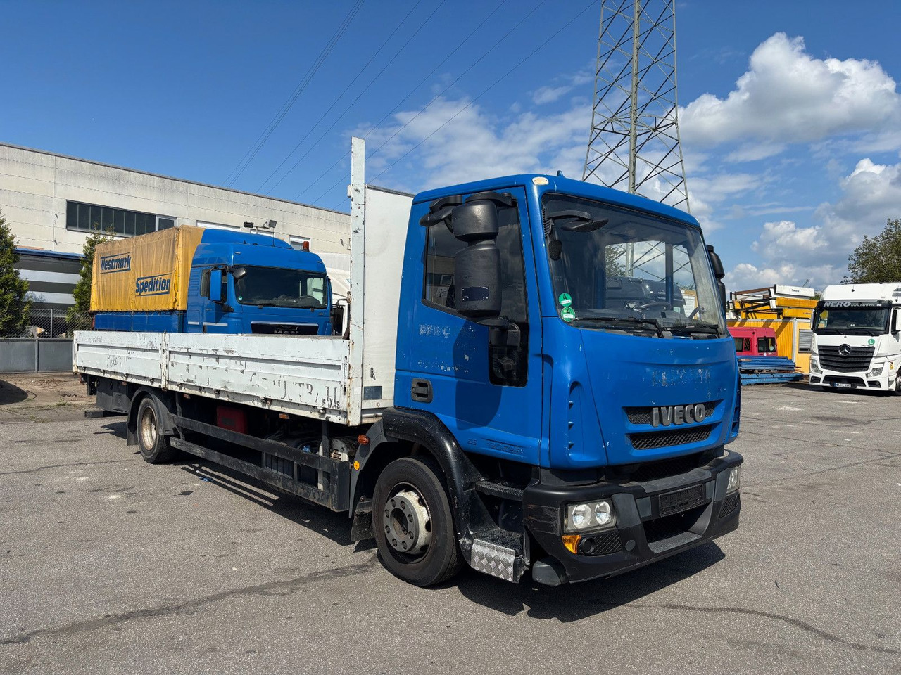 Iveco ML125E25 7.1m Retarder - Dropside/ Flatbed truck: picture 1 Iveco ML125E25 7.1m Retarder - Dropside/ Flatbed truck: picture 1