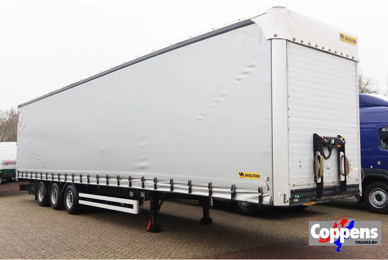 Wielton Mega Trailer with Terberg King Lifter contruction. Kooiaap aansluiting € 19.950.- netto. - Curtainsider semi-trailer: picture 1 Wielton Mega Trailer with Terberg King Lifter contruction. Kooiaap aansluiting € 19.950.- netto. - Curtainsider semi-trailer: picture 1