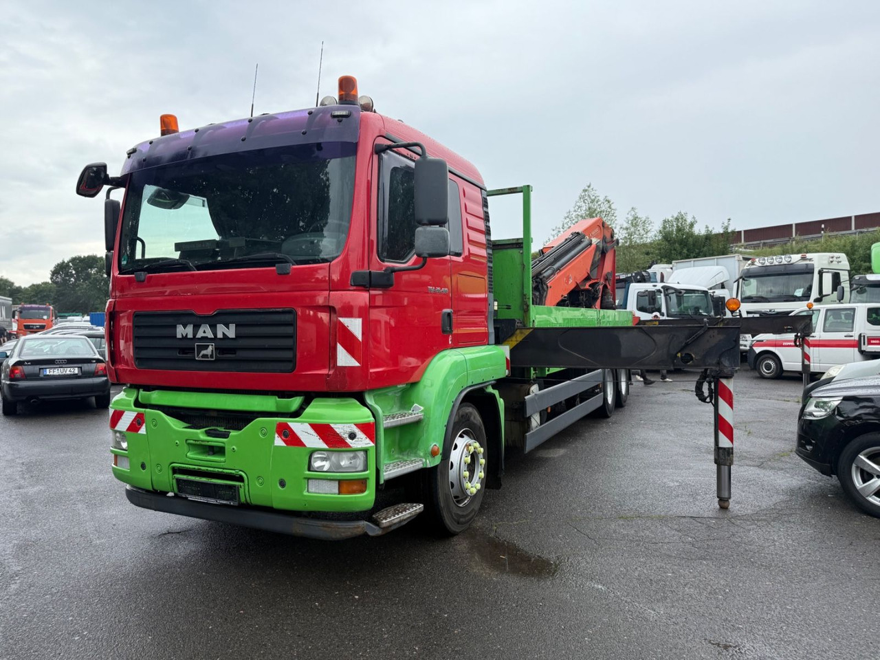 MAN TGA 26.410 - Dropside/ Flatbed truck, Crane truck: picture 1 MAN TGA 26.410 - Dropside/ Flatbed truck, Crane truck: picture 1