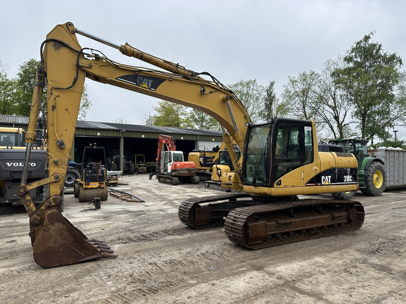 Caterpillar 318 CL Good undercarriage (not 320CL - 325CL) - Crawler excavator: picture 1 Caterpillar 318 CL Good undercarriage (not 320CL - 325CL) - Crawler excavator: picture 1