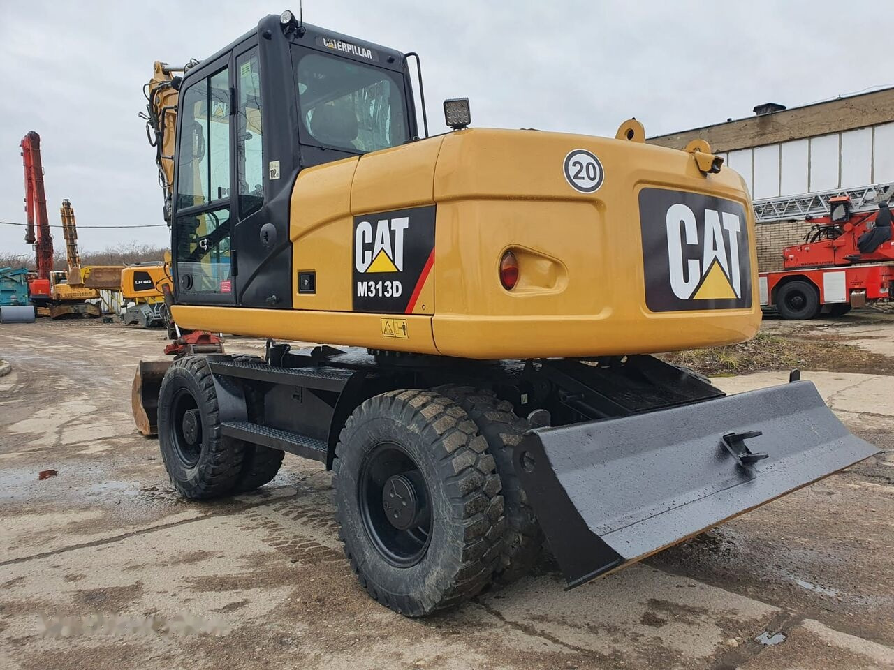 Wheel excavator Caterpillar M 313 D Tiltrotator: picture 11