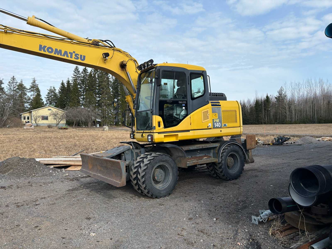 Wheel excavator Komatsu PW140-7 - Wheel excavator: picture 2 Wheel excavator Komatsu PW140-7 - Wheel excavator: picture 2