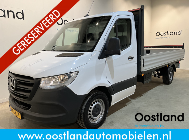 Mercedes-Benz Sprinter 315 CDI L3 RWD Open Laadbak / Euro 6 / Airco / MBUX / CarPlay / Navigatie / 3-Zits / 75.200 KM !! / BPM VRIJ !! - Flatbed van: picture 1 Mercedes-Benz Sprinter 315 CDI L3 RWD Open Laadbak / Euro 6 / Airco / MBUX / CarPlay / Navigatie / 3-Zits / 75.200 KM !! / BPM VRIJ !! - Flatbed van: picture 1
