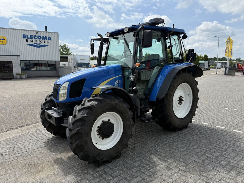 New Holland T5040 CAB + GPS - Farm tractor: picture 1 New Holland T5040 CAB + GPS - Farm tractor: picture 1