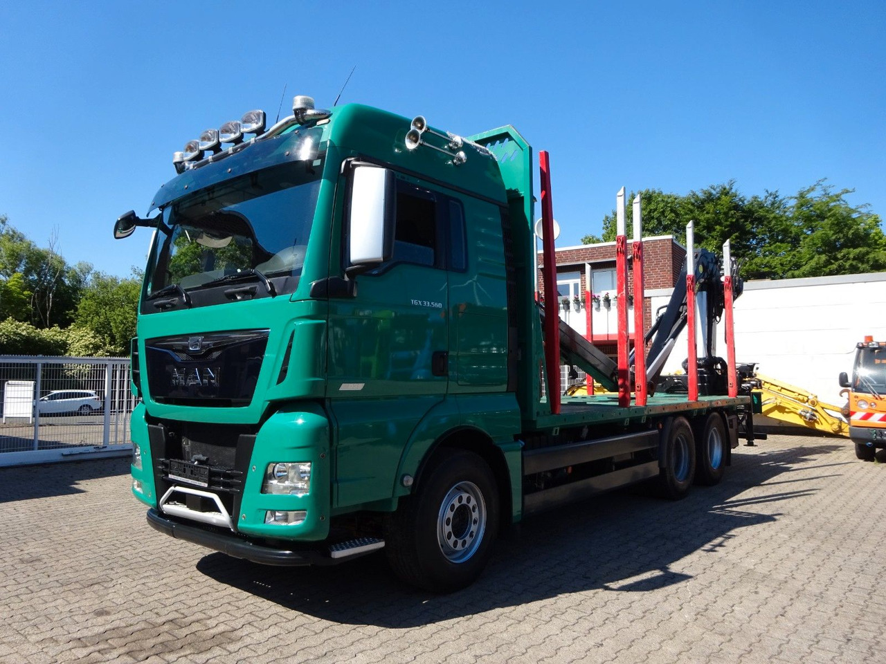 MAN 33.560 TGX mit TAJFUN L150Z Holzladekran 6x4 - Log truck, Crane truck: picture 2 MAN 33.560 TGX mit TAJFUN L150Z Holzladekran 6x4 - Log truck, Crane truck: picture 2