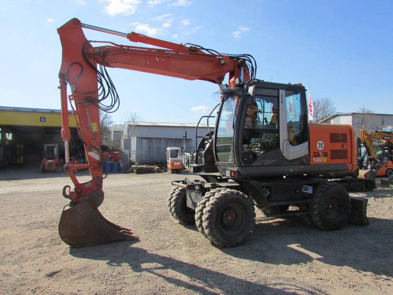 Hitachi ZX 140 W-3 Mobilbagger 45.000 EUR / Klima - Wheel excavator: picture 1 Hitachi ZX 140 W-3 Mobilbagger 45.000 EUR / Klima - Wheel excavator: picture 1