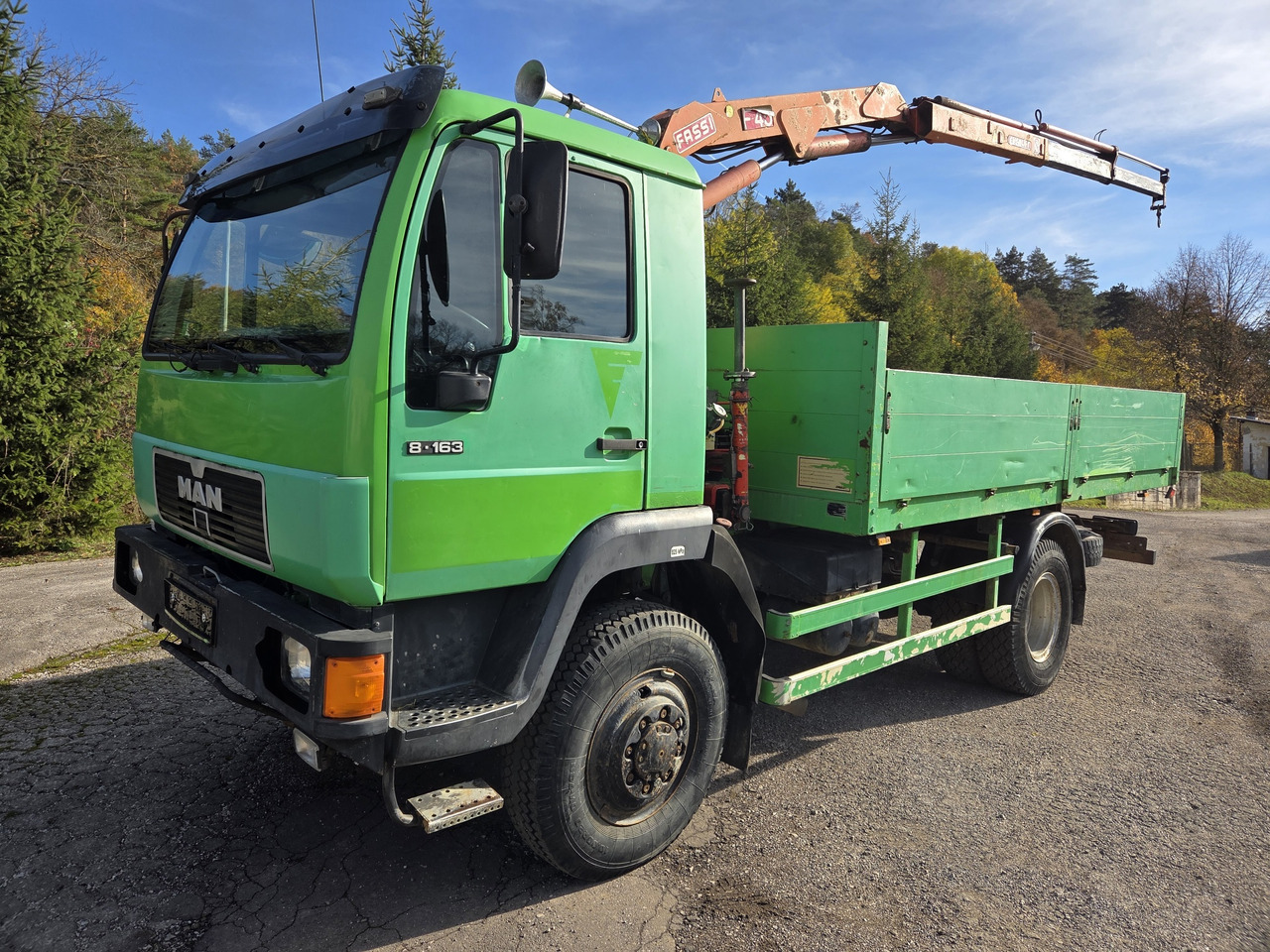MAN 8.163 4x4 + crane FASSI F45A.22 - Dropside/ Flatbed truck: picture 1 MAN 8.163 4x4 + crane FASSI F45A.22 - Dropside/ Flatbed truck: picture 1