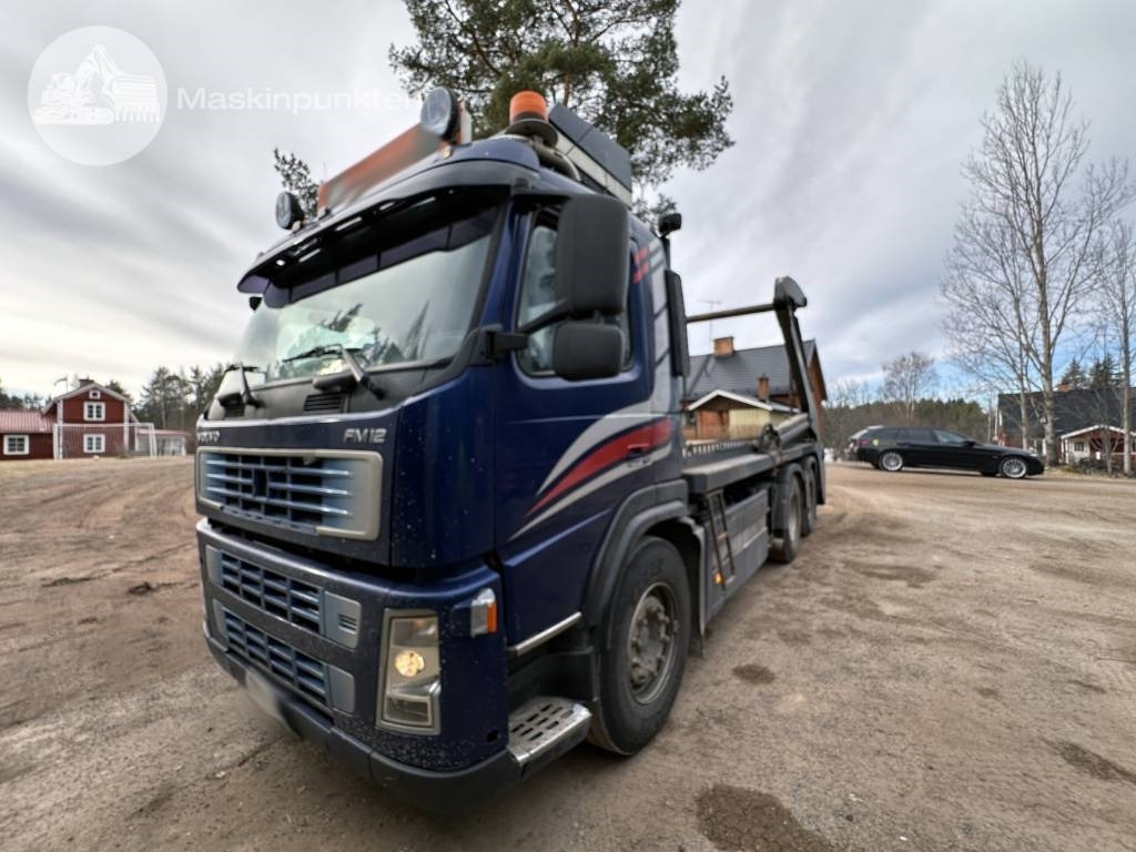 Volvo FM 12 420 LAXO Liftdumper + lastväxlare + flak - Skip loader truck: picture 1 Volvo FM 12 420 LAXO Liftdumper + lastväxlare + flak - Skip loader truck: picture 1