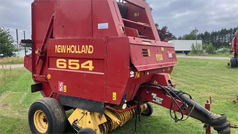 New Holland 654 RUNDBALLEPRESSER Cropcutter  - Round baler: picture 1 New Holland 654 RUNDBALLEPRESSER Cropcutter  - Round baler: picture 1