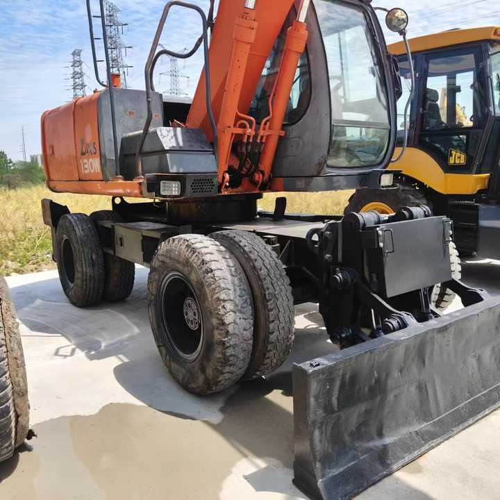 Used Japan Original Brand Hitachi Zx 130w Wheel Excavator Hitachi Zx120 130 200 Excavator for Sale - Excavator: picture 1 Used Japan Original Brand Hitachi Zx 130w Wheel Excavator Hitachi Zx120 130 200 Excavator for Sale - Excavator: picture 1