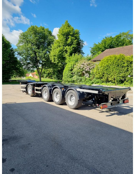 Nooteboom CT-53-04 D 4-Achs Containerchassis Combitrailer CT-53-04 D 4-Achs Containerchassis Combitrailer - Container transporter/ Swap body semi-trailer: picture 4 Nooteboom CT-53-04 D 4-Achs Containerchassis Combitrailer CT-53-04 D 4-Achs Containerchassis Combitrailer - Container transporter/ Swap body semi-trailer: picture 4