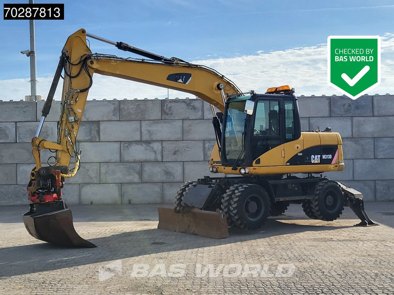 Caterpillar M313 D OUTRIGGERS + BLADE - Wheel excavator: picture 1 Caterpillar M313 D OUTRIGGERS + BLADE - Wheel excavator: picture 1
