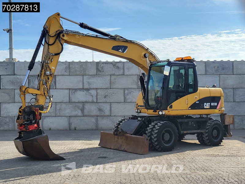 Caterpillar M313 D OUTRIGGERS + BLADE - Wheel excavator: picture 2 Caterpillar M313 D OUTRIGGERS + BLADE - Wheel excavator: picture 2