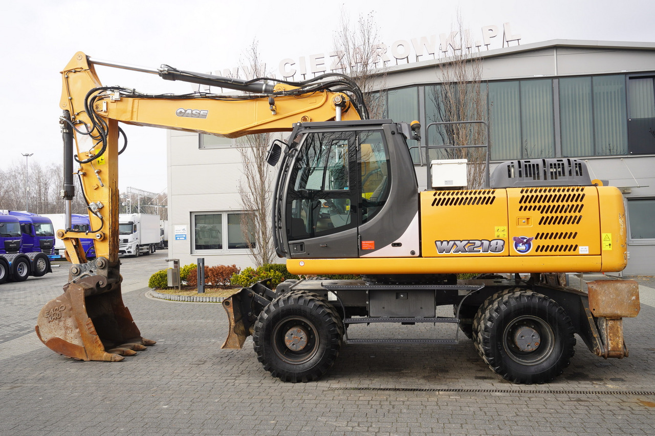 CASE WX218 / 23t wheeled excavator / 3 times folding arm - Wheel excavator: picture 1 CASE WX218 / 23t wheeled excavator / 3 times folding arm - Wheel excavator: picture 1