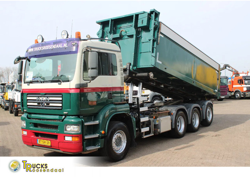 MAN TGA 35.400 8X4 + MANUAL! + NCH kipper/ bitum sprayer - Cable system truck: picture 1 MAN TGA 35.400 8X4 + MANUAL! + NCH kipper/ bitum sprayer - Cable system truck: picture 1