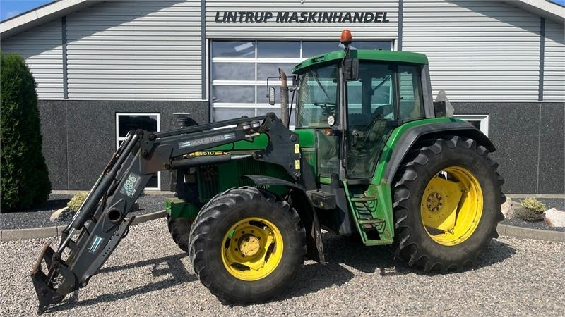 John Deere 6510 Med frontlæsser - Farm tractor: picture 1 John Deere 6510 Med frontlæsser - Farm tractor: picture 1