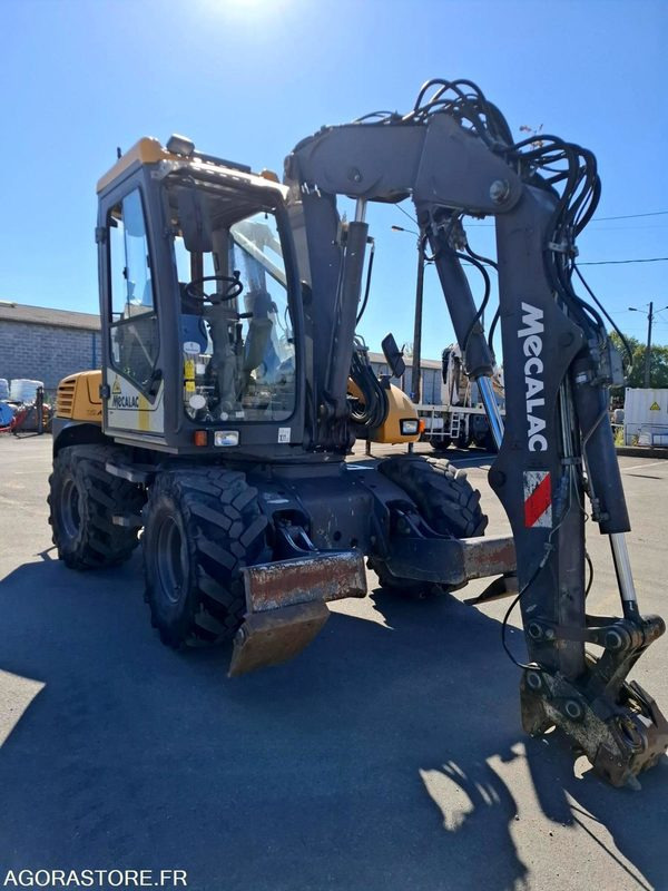 Pelle sur pneus MECALAC 12MTX - N° série 42770 - 2014 - 11400 heures - Excavator: picture 5 Pelle sur pneus MECALAC 12MTX - N° série 42770 - 2014 - 11400 heures - Excavator: picture 5
