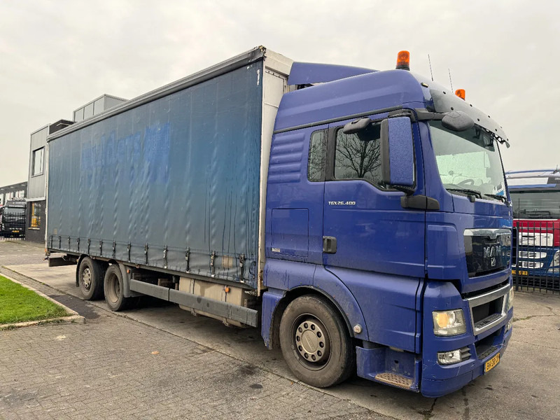 MAN TGX 26.400 6X2 - EURO 4 + LIFT + STEERING AXLE + TÜV 10-2025 - Curtainsider truck: picture 3 MAN TGX 26.400 6X2 - EURO 4 + LIFT + STEERING AXLE + TÜV 10-2025 - Curtainsider truck: picture 3